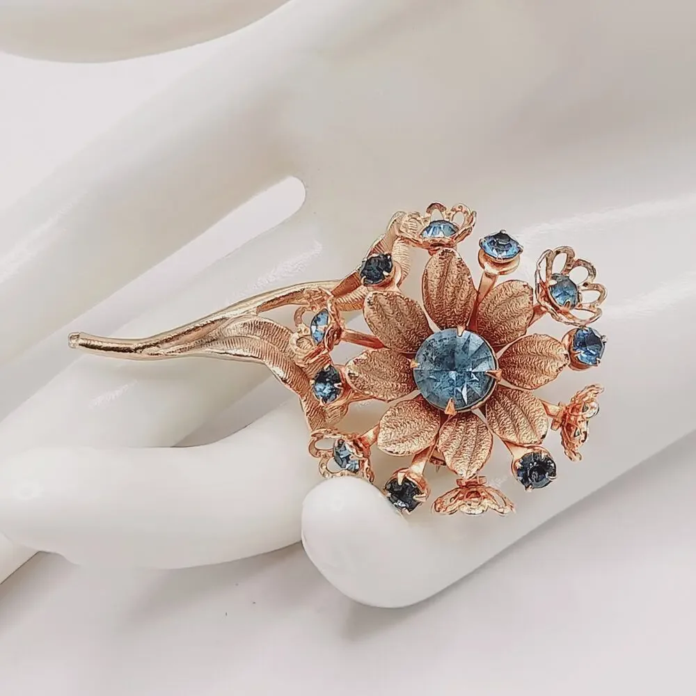 Vintage Blue Rhinestone Flower Brooch Gold Tone Floral Stem Pin